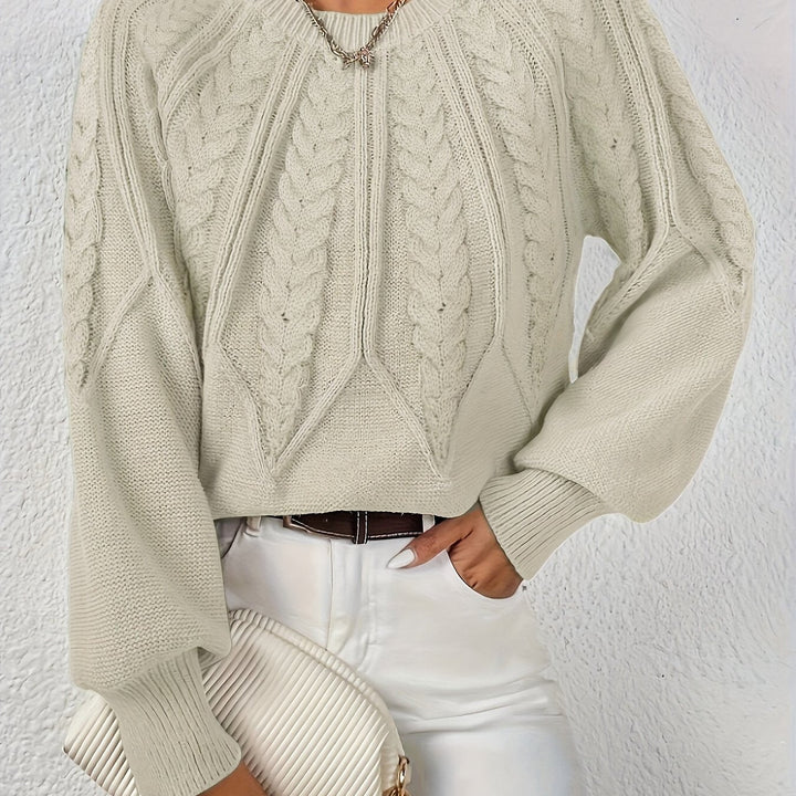 Women's pullover cable knit sweater, relaxed fit, long sleeves, and charming lantern sleeves.