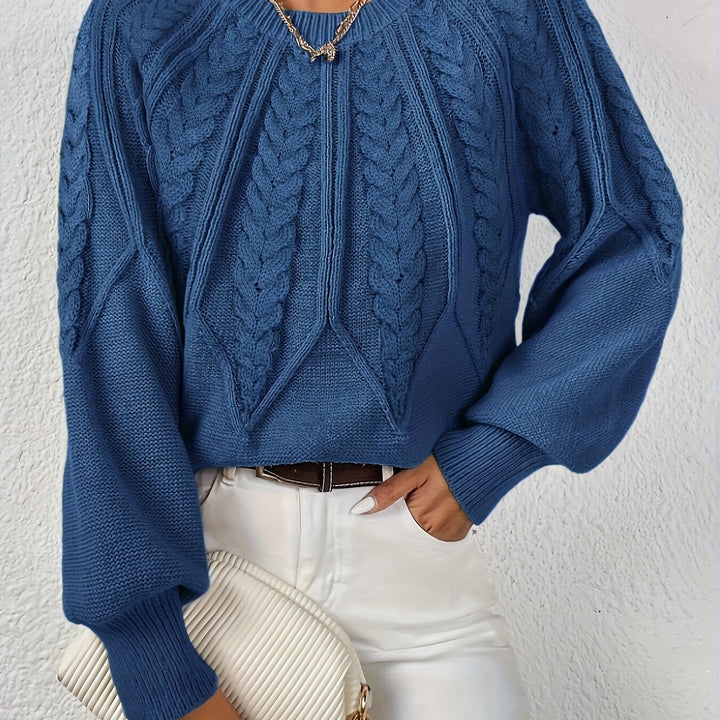Women's winter relaxed fit cable knit sweater, cozy and chic with lantern sleeves.