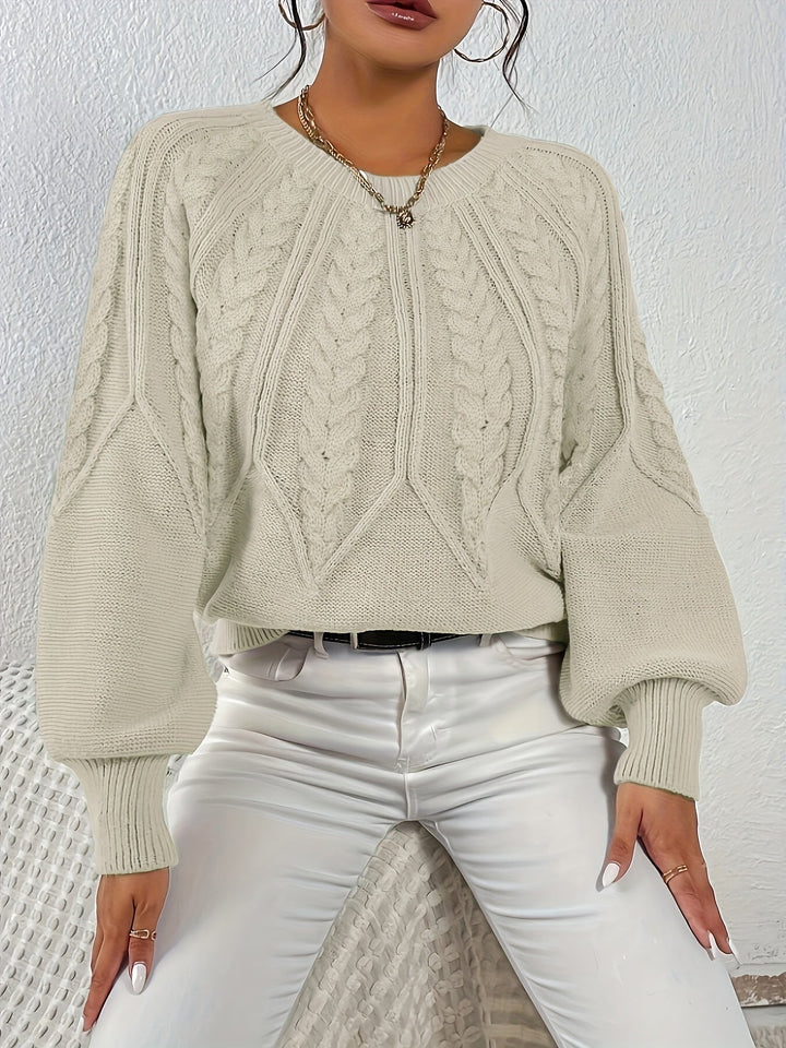 Relaxed fit women's cable knit sweater, comfortable and warm with long lantern sleeves.