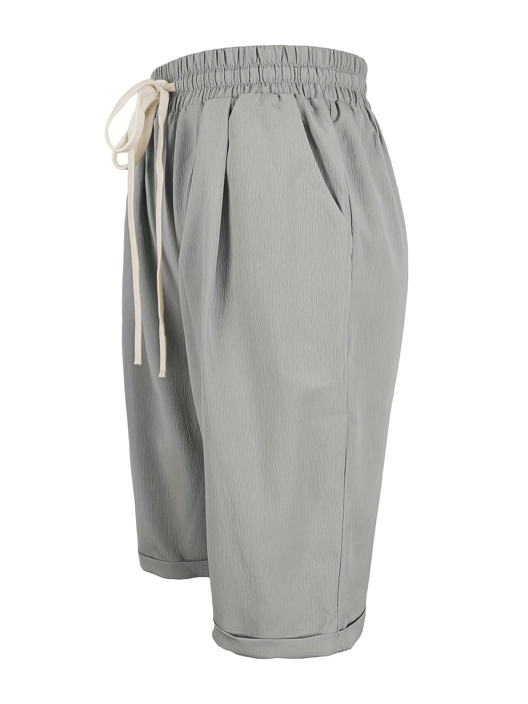 Practical & stylish women's relaxed fit capri pants with elastic waist. Ideal for casual summer days.