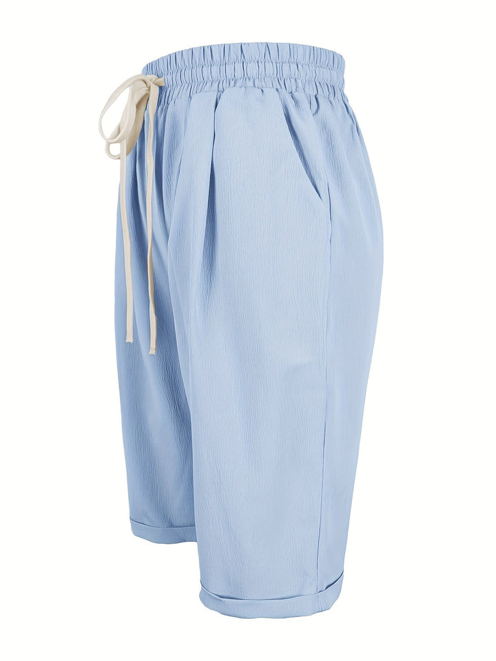 Comfortable women's capri pants, relaxed fit & elastic waist. Versatile for daily wear or vacation.