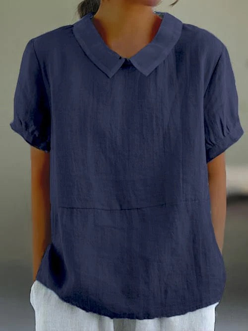 Women's short sleeve blouse with classic Peter Pan collar, relaxed fit for ultimate summer comfort.