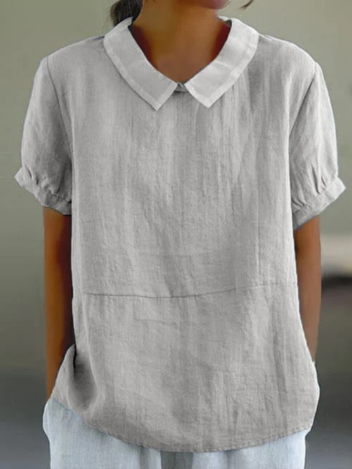 Stylish women's relaxed fit blouse, Peter Pan collar, perfect casual top for warm weather & everyday.
