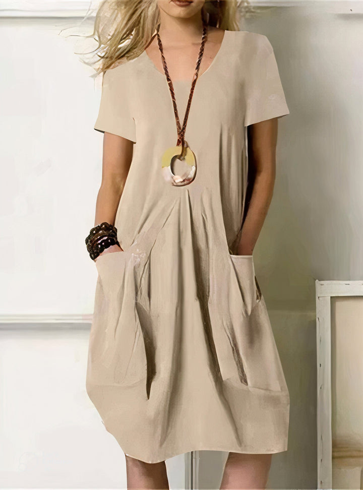 Orange women's casual dress with pockets. Relaxed fit, ideal for summer & spring everyday style.