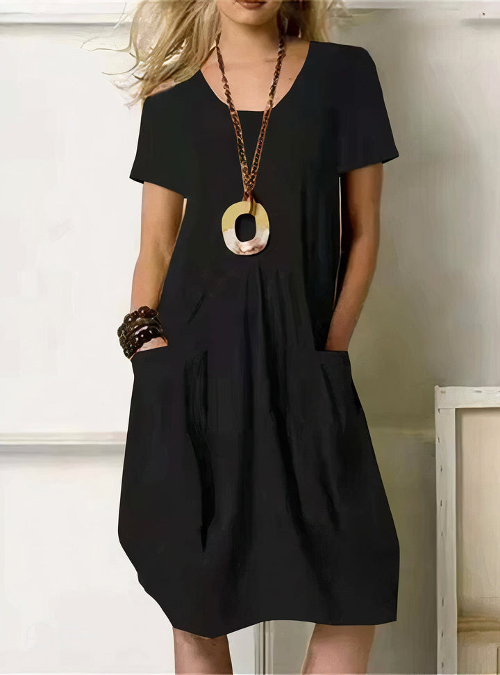 Black women's casual dress, relaxed fit & comfortable. Versatile for spring, summer, or fall everyday wear.