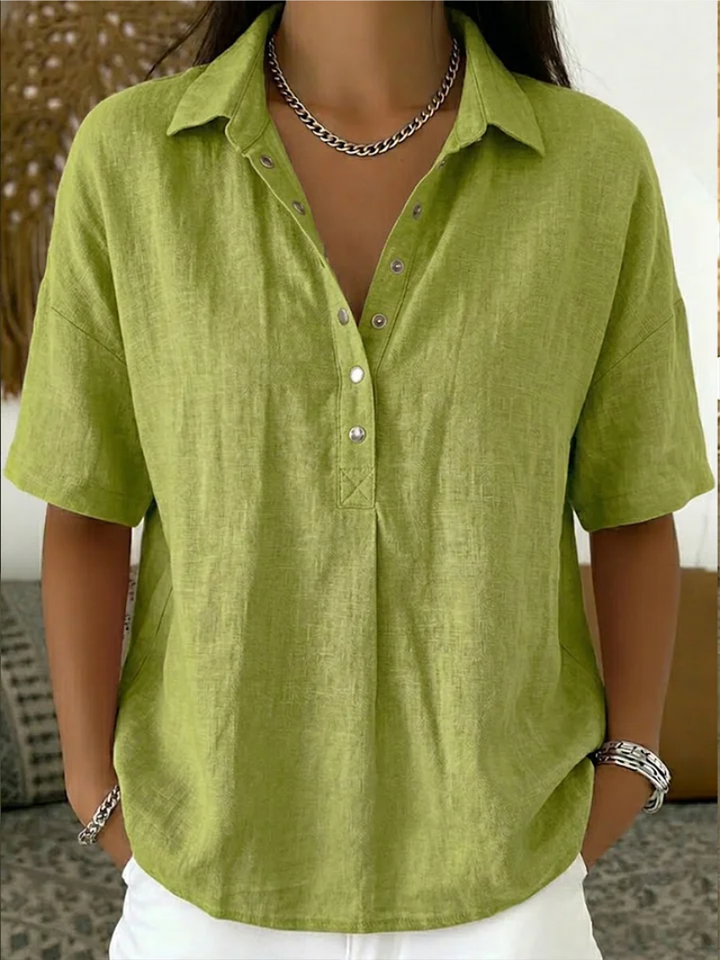 Stylish short sleeve women's collar shirt, relaxed fit, button detail. Perfect casual top for summer and spring fashion.