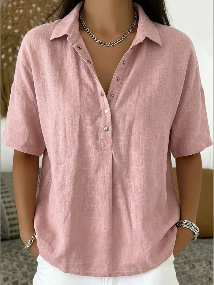 Versatile women's relaxed fit collar shirt, button-down front, short sleeve design. An essential casual top for women.
