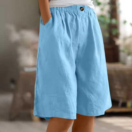 Versatile women's mid-thigh shorts, relaxed fit with elastic waist for active summer days.