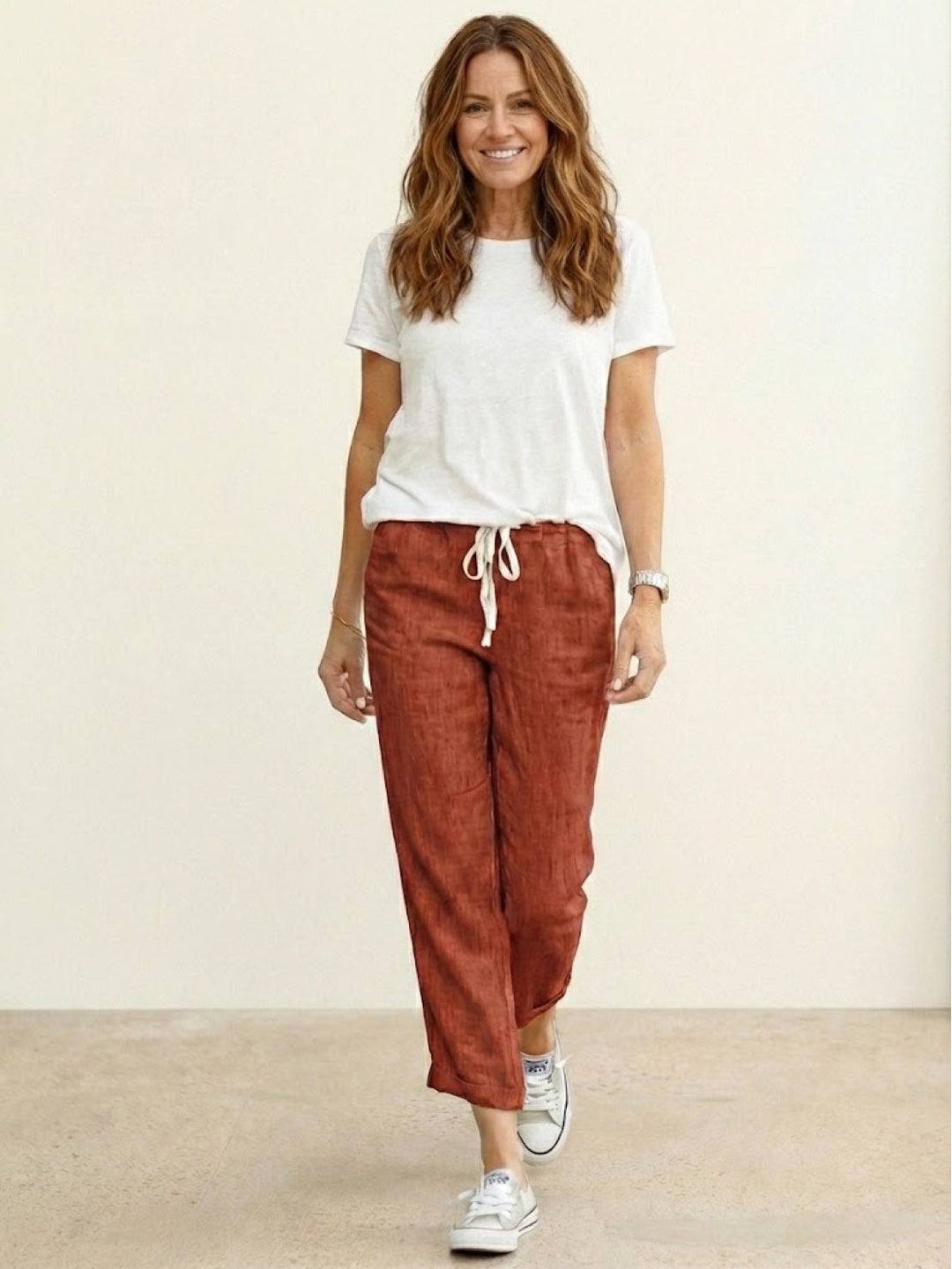 Casual women's drawstring pants, relaxed fit with a chic cuffed hem.