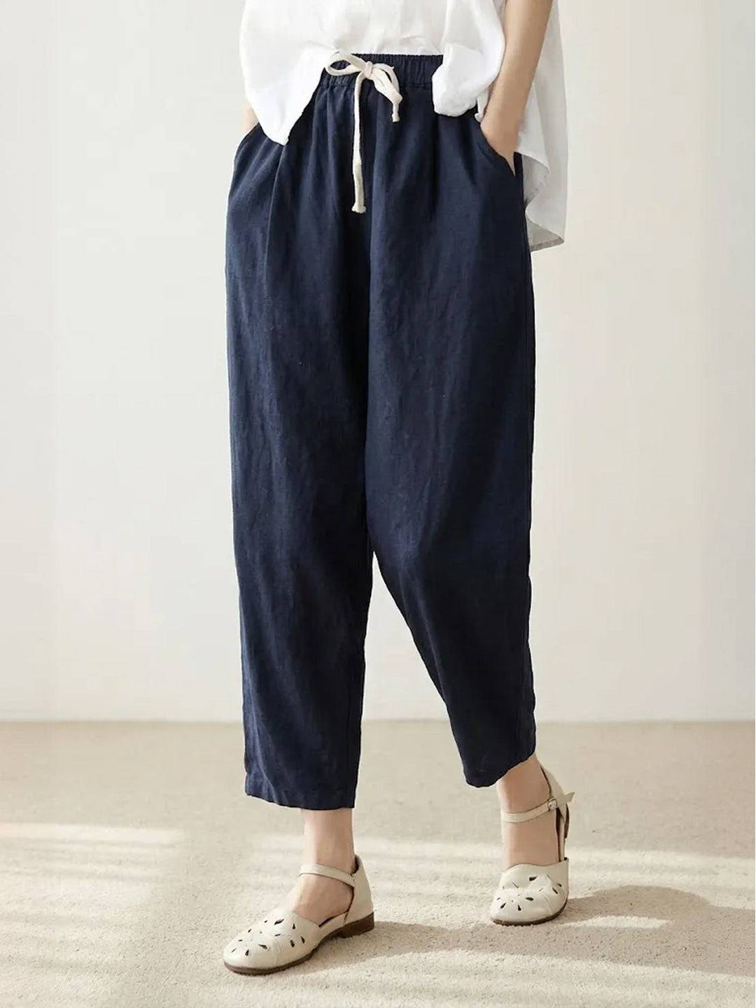 Women's casual chic cuffed pants, relaxed fit, elastic waist for versatile styling.