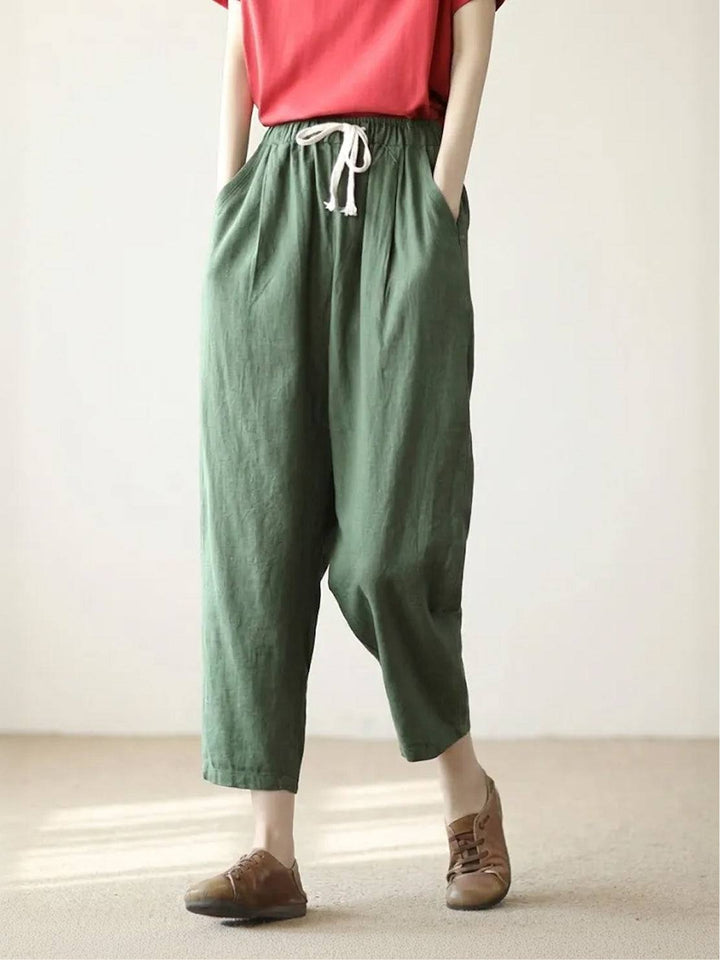 Travel ready women's relaxed fit pants, cuffed hem, comfortable for any journey.