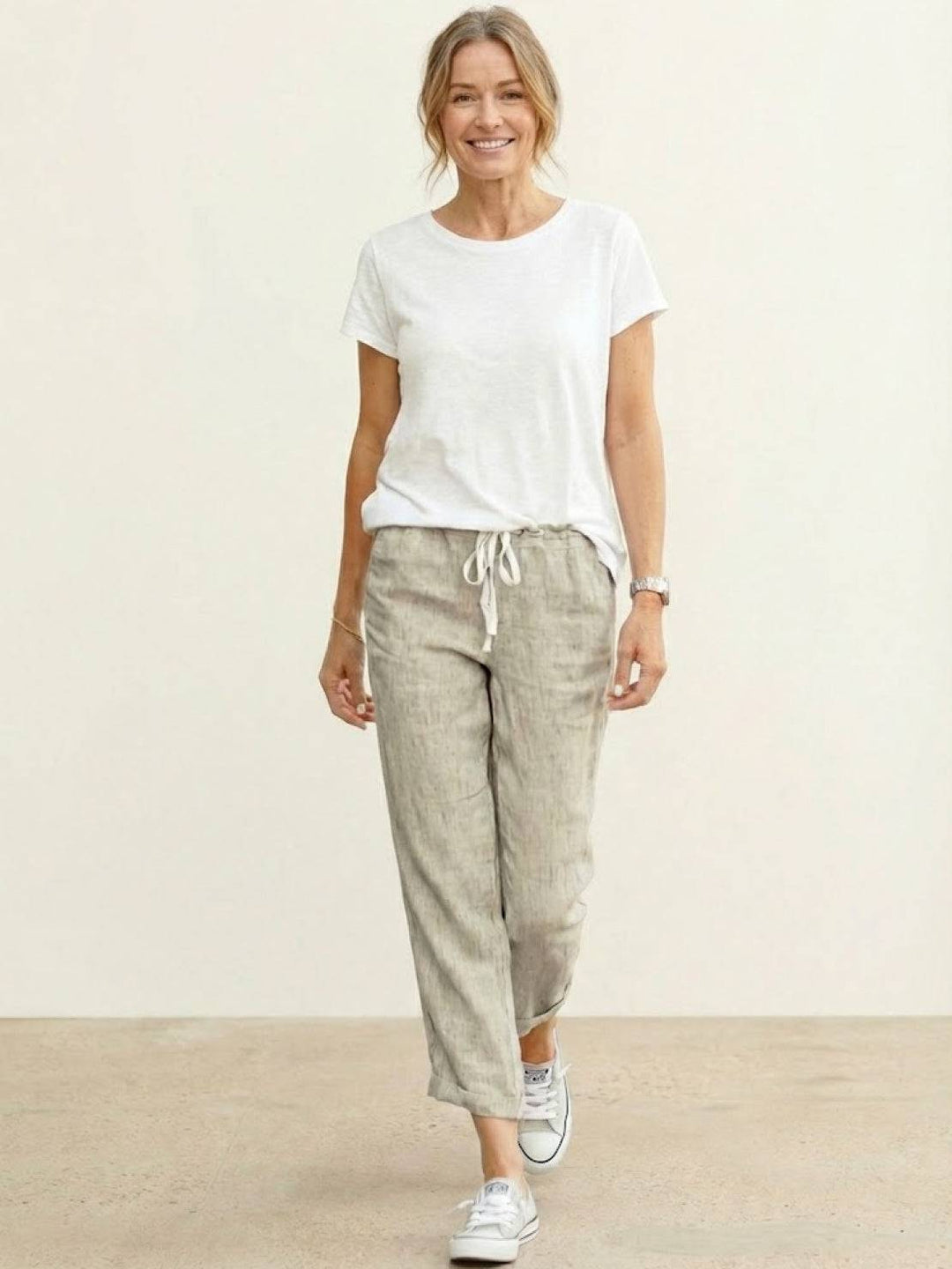 Versatile women's cuffed pants, travel friendly and ideal for warm weather comfort.