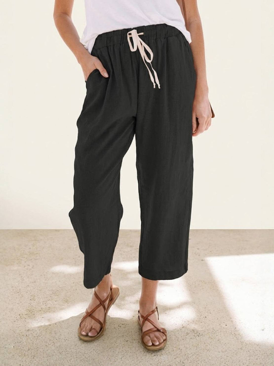 Women's versatile cuffed pants, perfect for summer, travel, and casual chic looks.