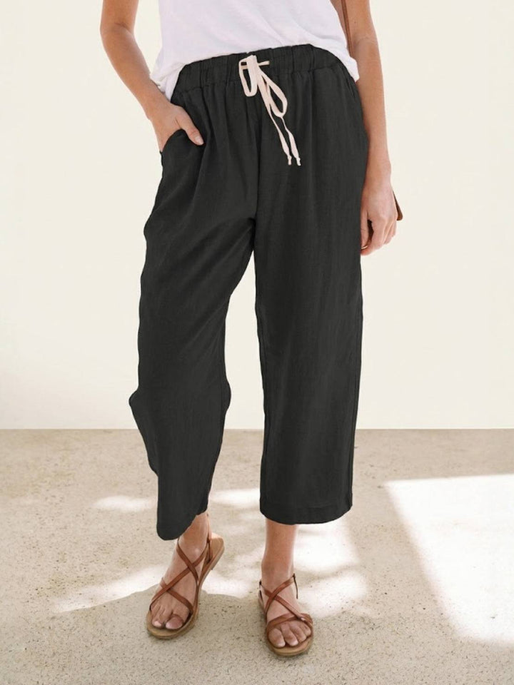 Women's versatile cuffed pants, perfect for summer, travel, and casual chic looks.