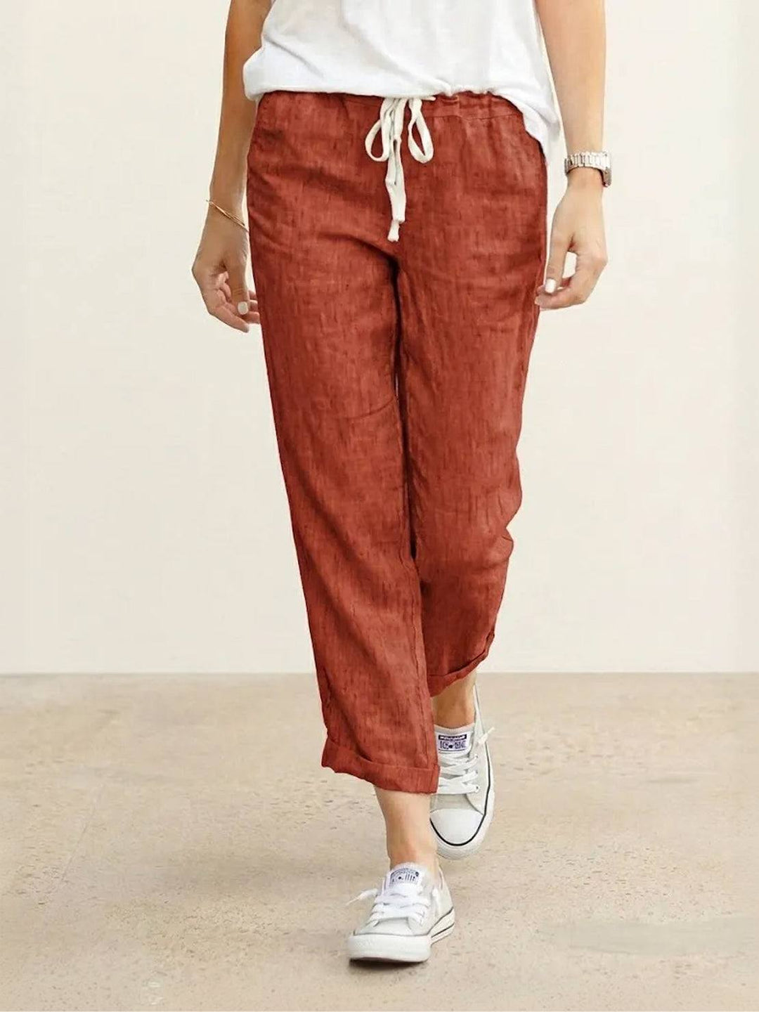 Comfortable women's relaxed fit pants with a drawstring and cuffed hem detail.