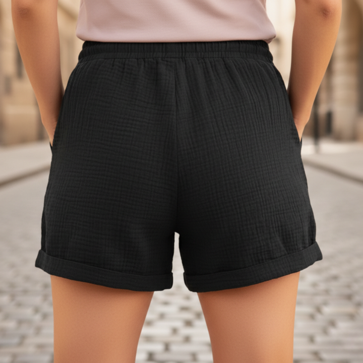 Stylish women's casual drawstring shorts in a relaxed fit, ideal for warm weather & beach days.
