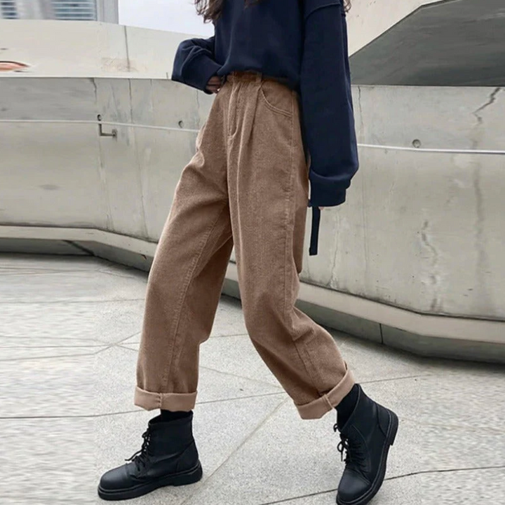 Relaxed fit women's trousers offering a comfortable and modern silhouette.