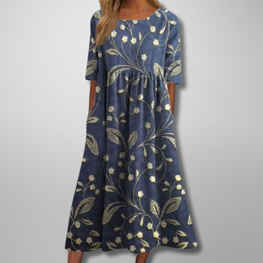 Women's relaxed fit floral midi dress, perfect for comfortable and elegant everyday style.