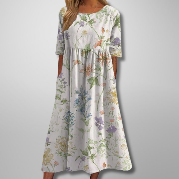 Elegant women's floral midi dress, a feminine choice for effortless spring and summer fashion.