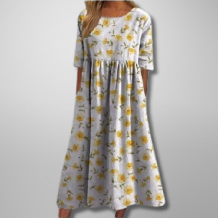 Beautiful women's floral midi dress with a relaxed silhouette, perfect for warm weather comfort.