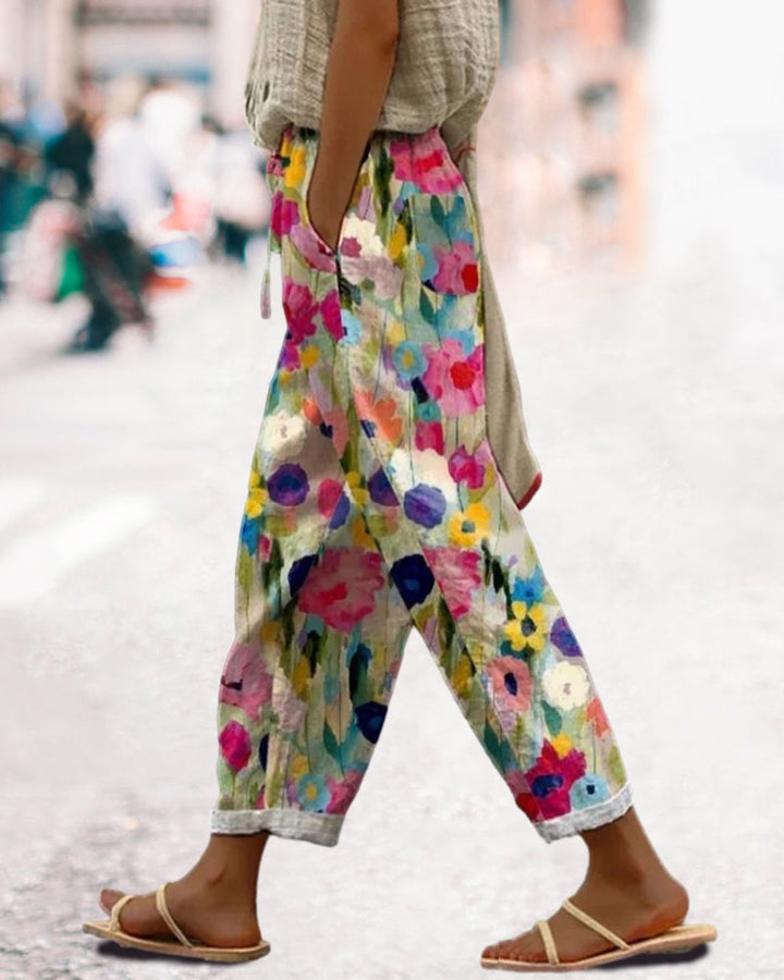 Women's relaxed fit floral print trousers, perfect for effortless comfort. Stylish bohemian pants for summer casual wear.