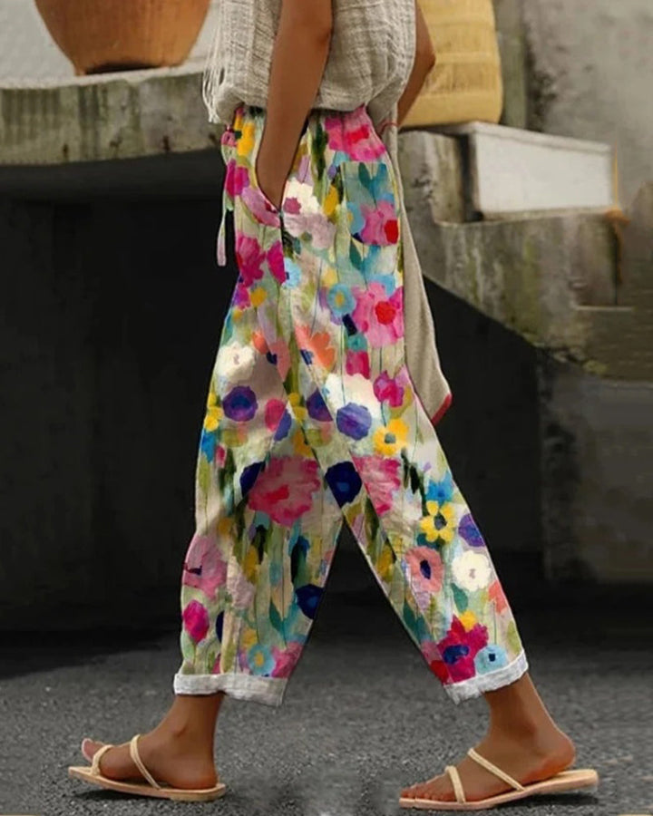 Comfy women's relaxed fit floral trousers. Chic bohemian printed pants for everyday style and summer fashion.