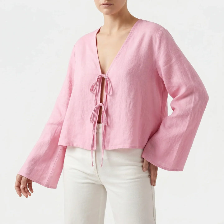 White women's V-neck front-tie blouse with relaxed fit and elegant flared sleeves for summer style.