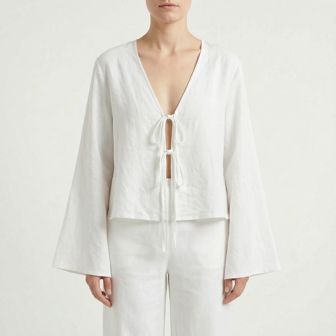 Relaxed fit women's front-tie blouse in pink, green, or white; versatile summer V-neck top.