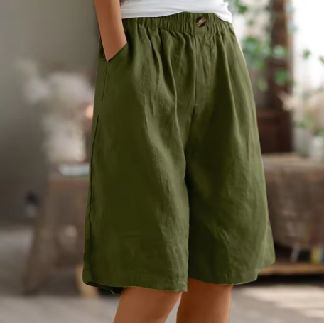 Women's relaxed fit high-waisted Bermuda shorts, perfect for casual summer everyday wear. Elastic waist comfort.