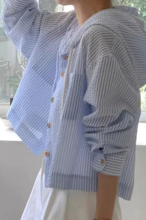 Casual women's hooded blouse, relaxed fit long sleeve for comfortable everyday wear, summer, travel, & beach.