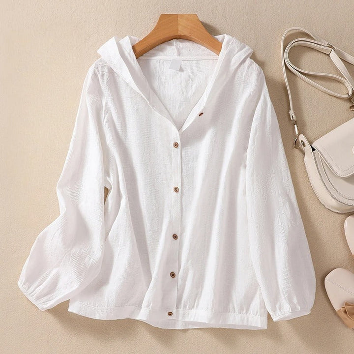 Women's relaxed fit hooded shirt for effortless casual wear. Perfect for everyday comfort.