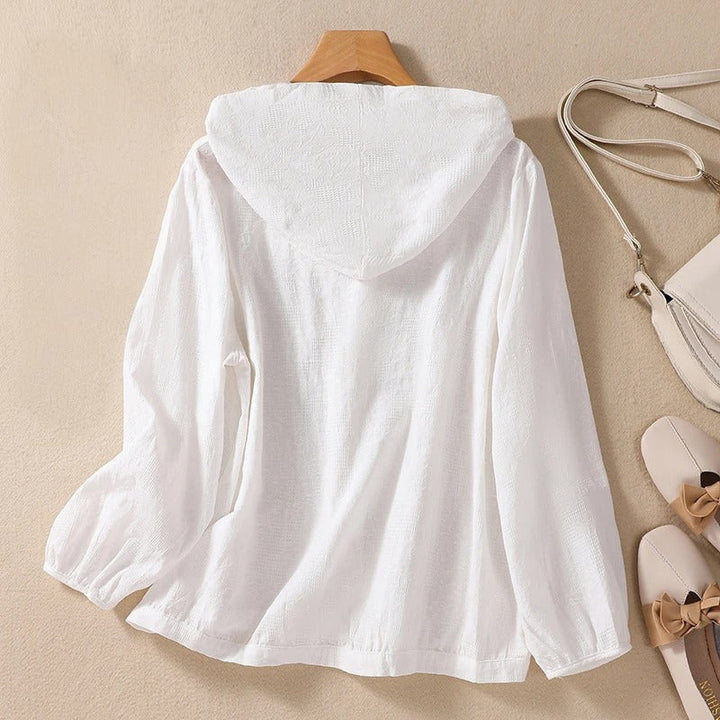 Comfortable women's relaxed fit hooded shirt, great for casual everyday style & layering.