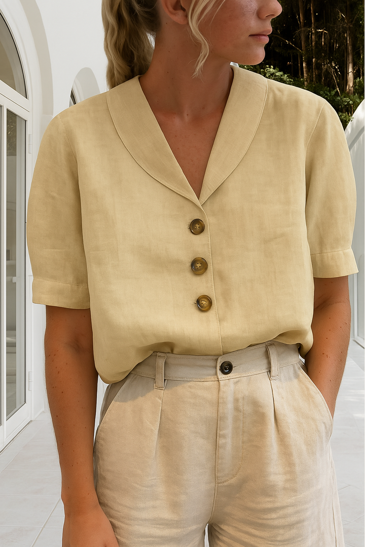 Back view of a women's relaxed fit linen short sleeve t-shirt, showing comfortable, loose drape for summer apparel.