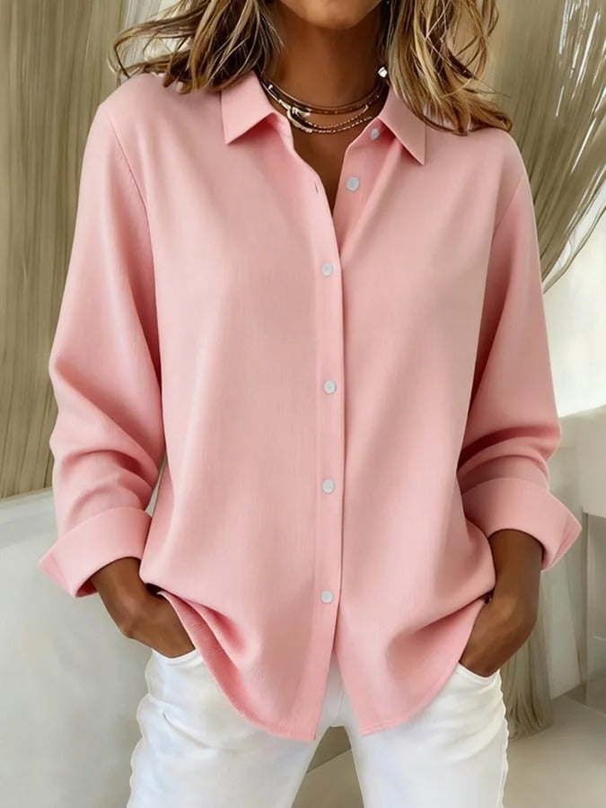 Stylish women's relaxed fit button down blouse, versatile for professional or everyday wear.