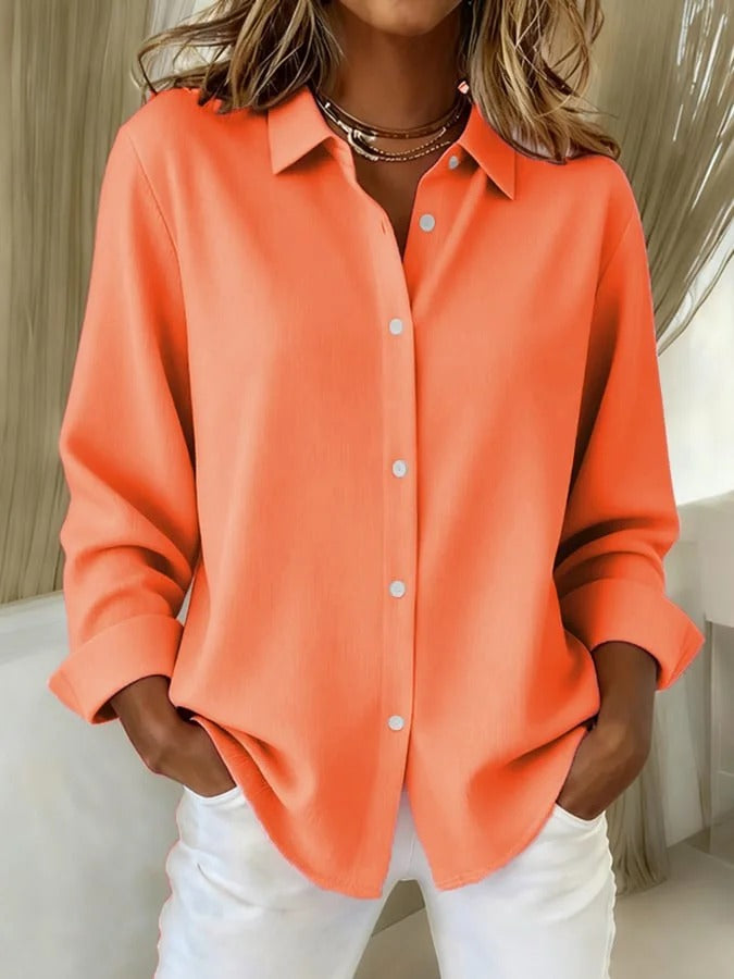 Women's professional long sleeve button down blouse, ideal for office or chic casual outfits.