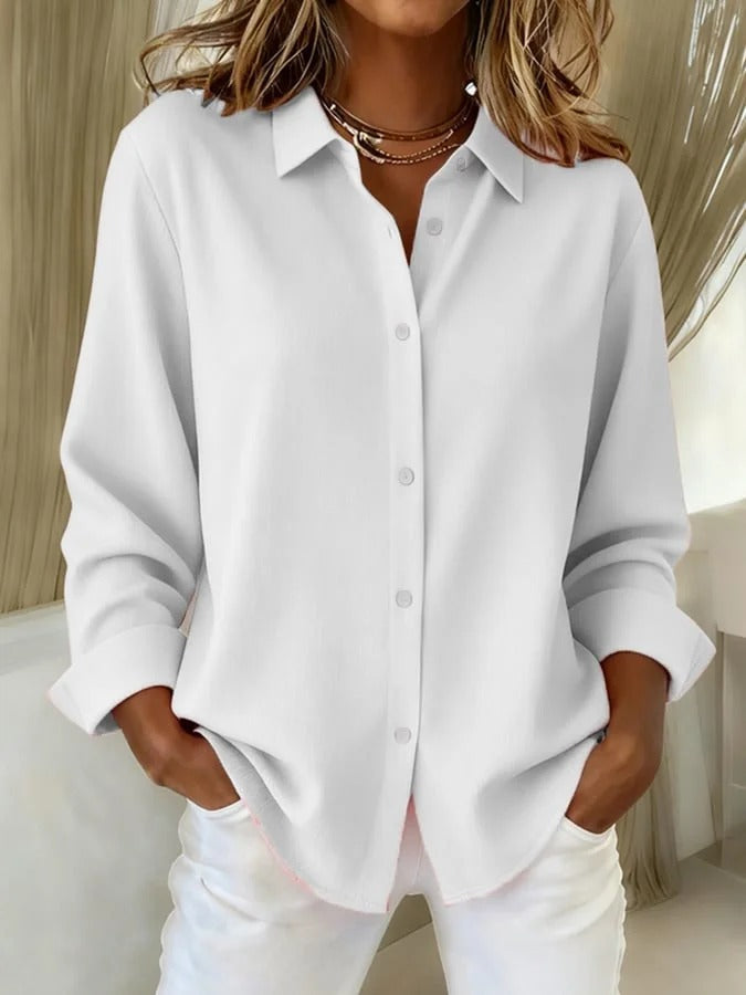 Relaxed fit women's long sleeve button down shirt. A versatile blouse for work or smart casual looks.