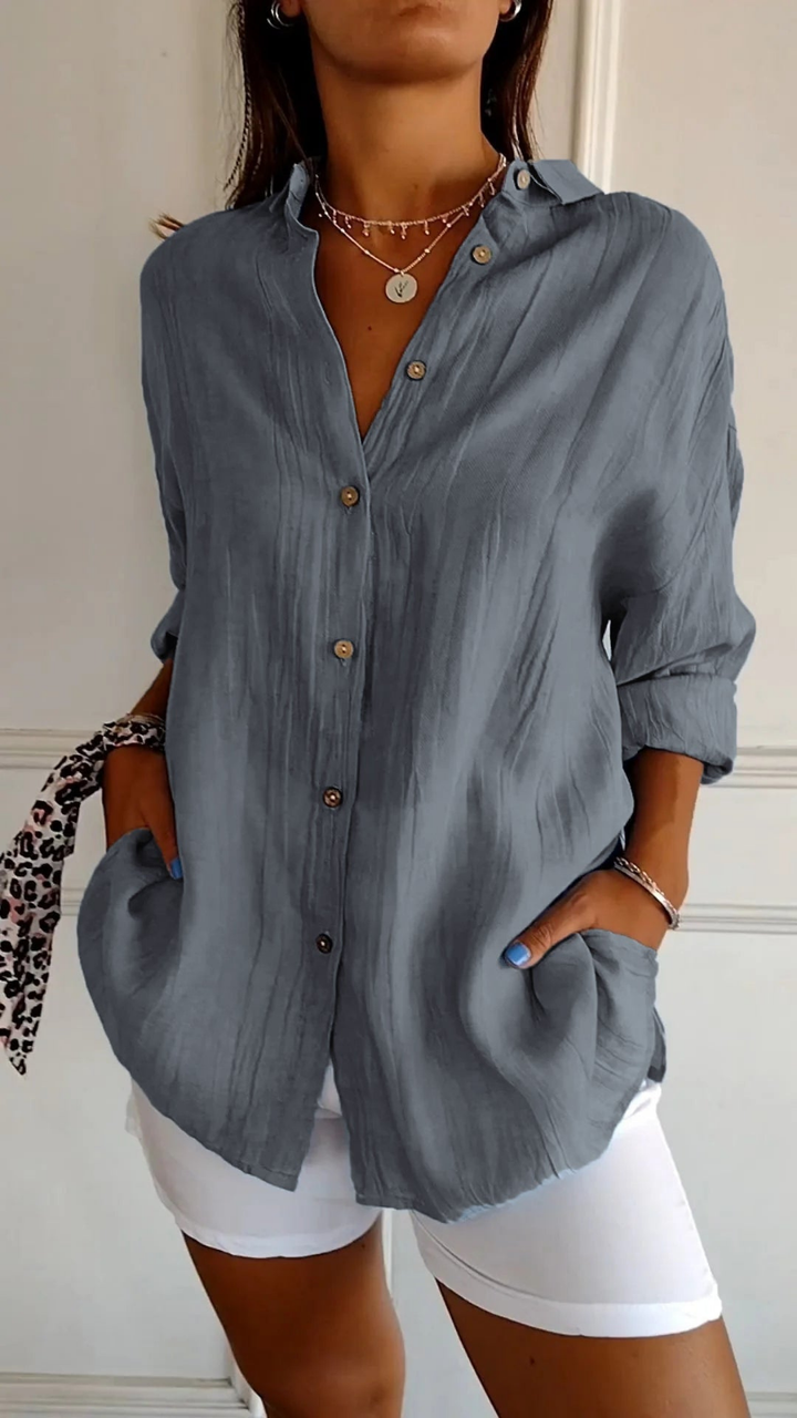 Layering women's oversized long sleeve button-up shirt, a versatile relaxed fit blouse.