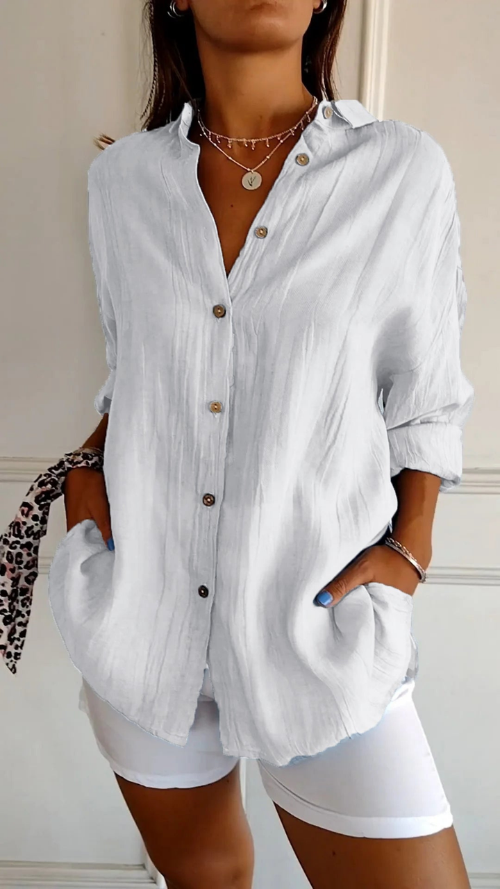 Chic ladies oversized long sleeve button-up top, a relaxed fit blouse for versatile fashion.