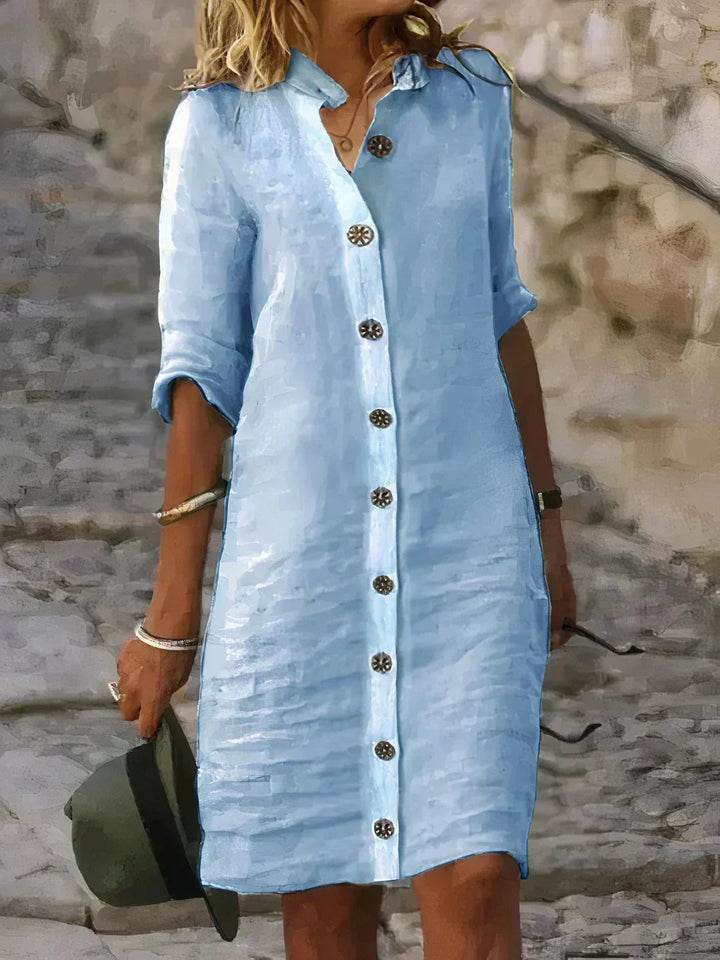 Women's relaxed fit midi dress with button-up front, perfect for spring & summer casual wear.