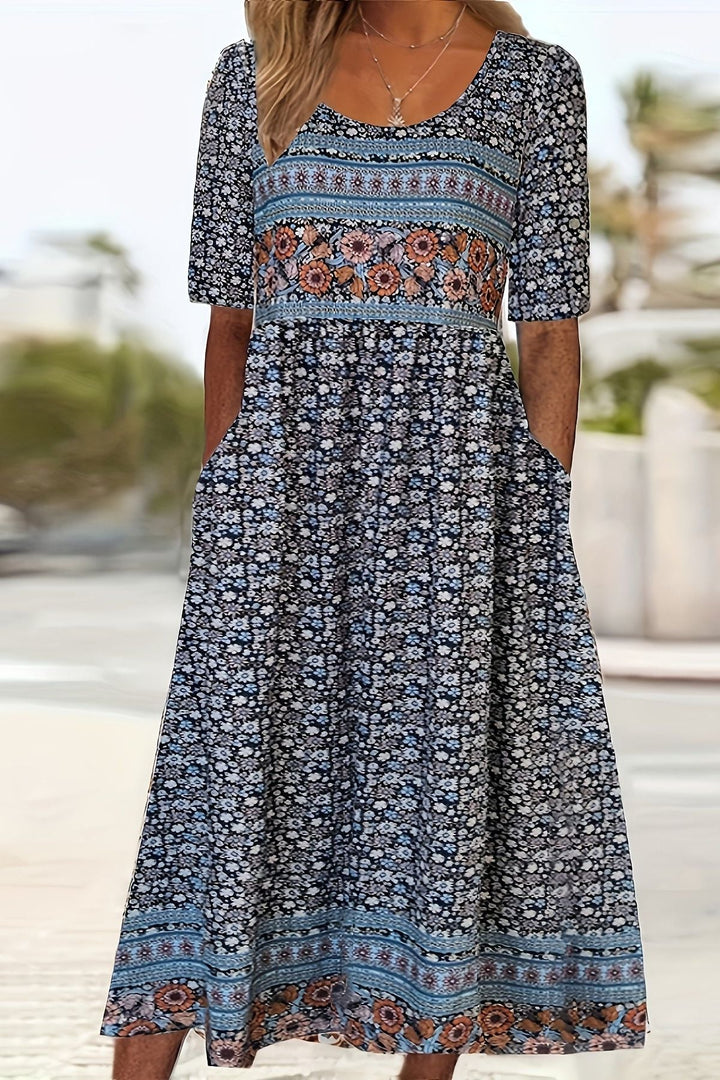Flowy women's daisy print midi dress, relaxed for everyday wear or a chic summer casual style, very comfortable.