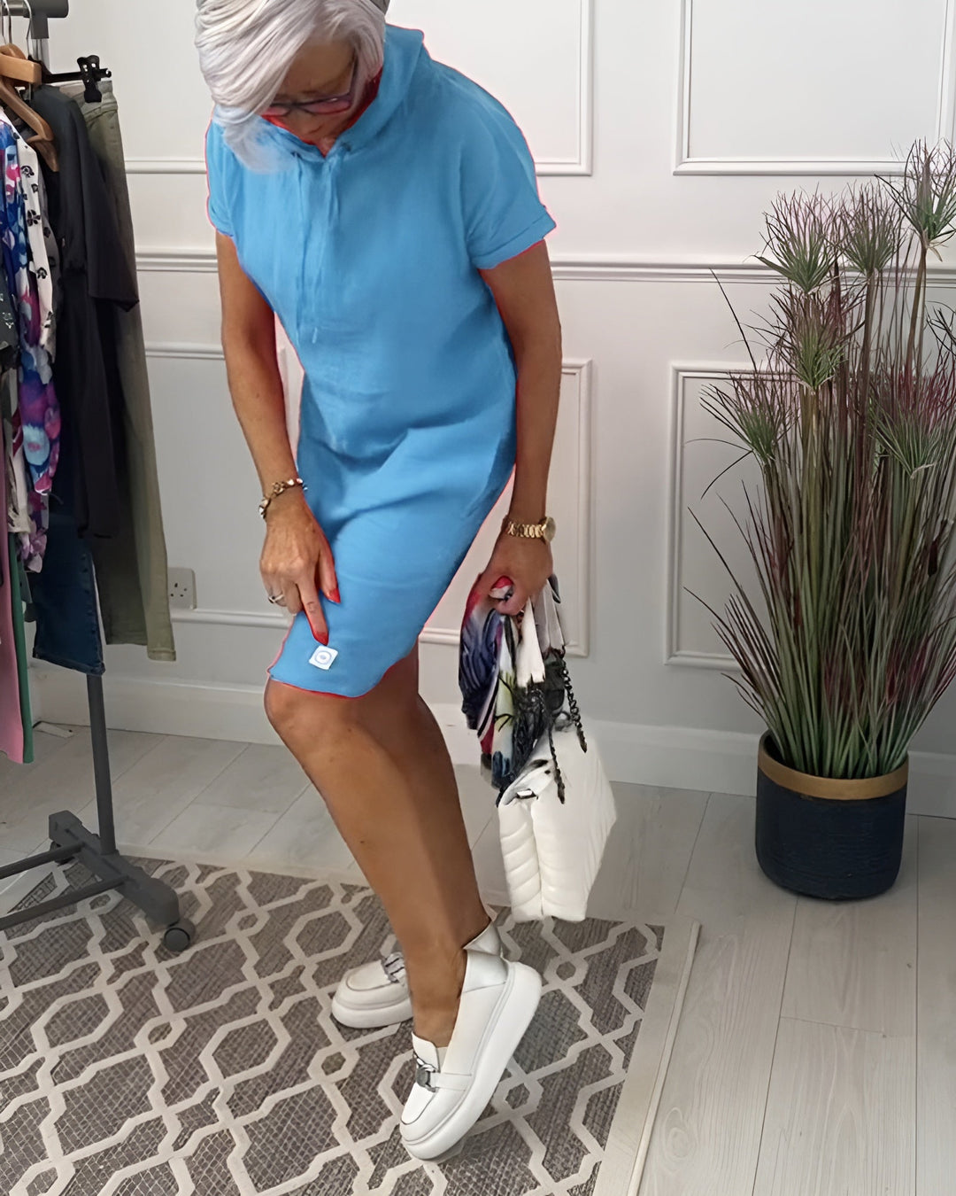 Versatile women's half sleeve relaxed fit midi dress, a chic hoodie style for casual outings.