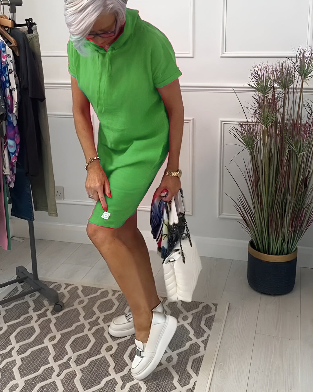 Comfortable women's casual midi dress with an adjustable hood and relaxed fit for any day.