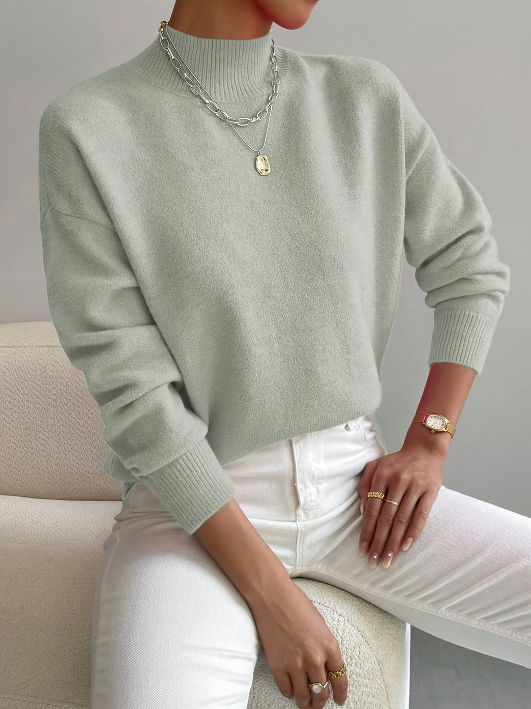 Women's relaxed fit mock turtleneck sweater, long sleeve. Cozy fall & winter pullover for casual comfort.