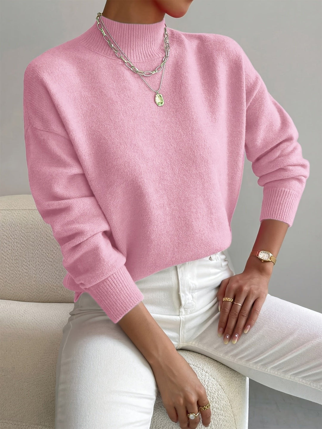 Cozy women's relaxed fit mock turtleneck sweater, long sleeve. Essential for fall & winter chic comfort.