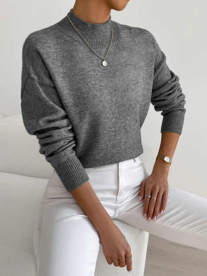 Fall/winter women's long sleeve mock turtleneck sweater, relaxed fit pullover. Cozy and chic for daily wear.
