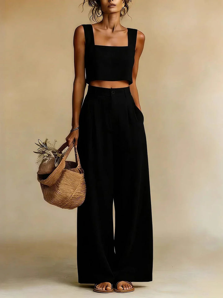 Elegant women's two-piece palazzo set. Relaxed top & wide-leg pants perfect for vacation, brunch, or summer.