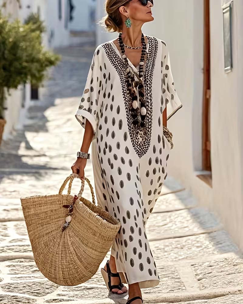 Women's relaxed fit polka dot maxi kaftan dress, perfect for summer vacation & resort wear.