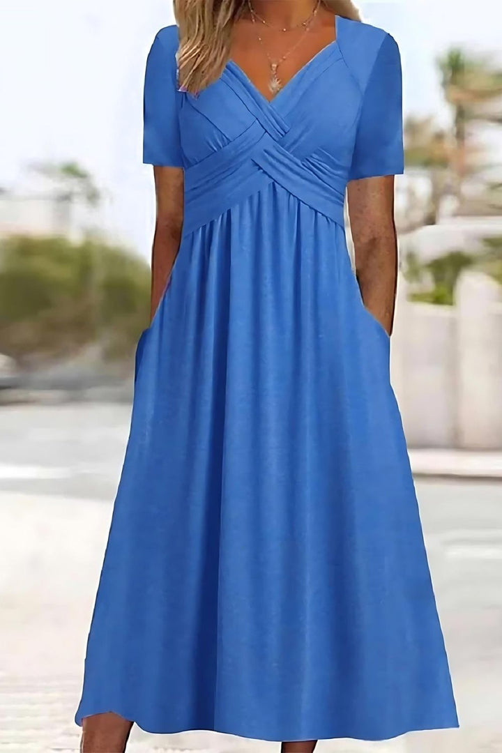 Women's relaxed fit printed midi dress, perfect for casual spring & summer everyday wear. Comfortable and flowing style.