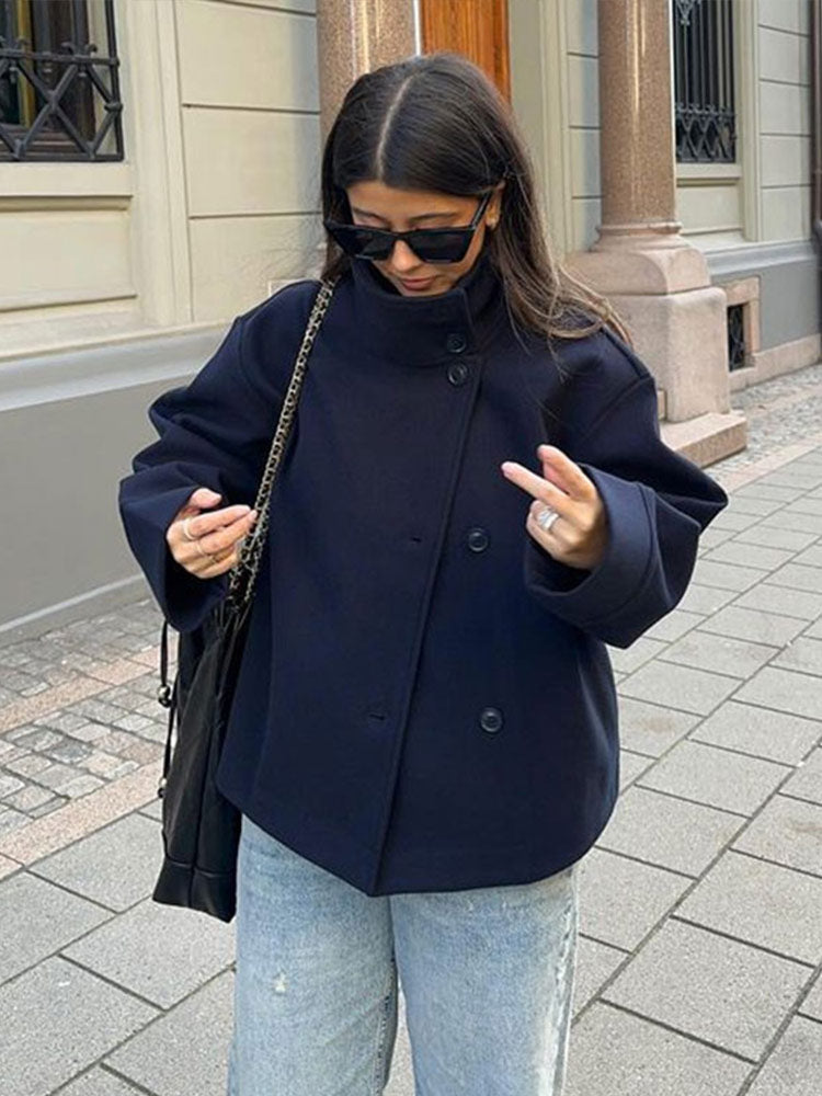 Casual women's short coat, relaxed fit, button-front, high neck. Ideal for fall & winter fashion.