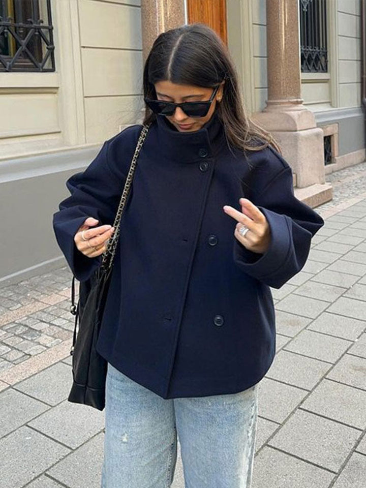 Casual women's short coat, relaxed fit, button-front, high neck. Ideal for fall & winter fashion.